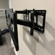 Wall mounted TV mount. Sturdy. Secure. Straight