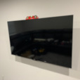 Perfectly level! I always install TVs using a level