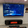 TV and a wall-mounted floating TV stand with fireplace