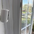 A Ring camera monitoring through a window